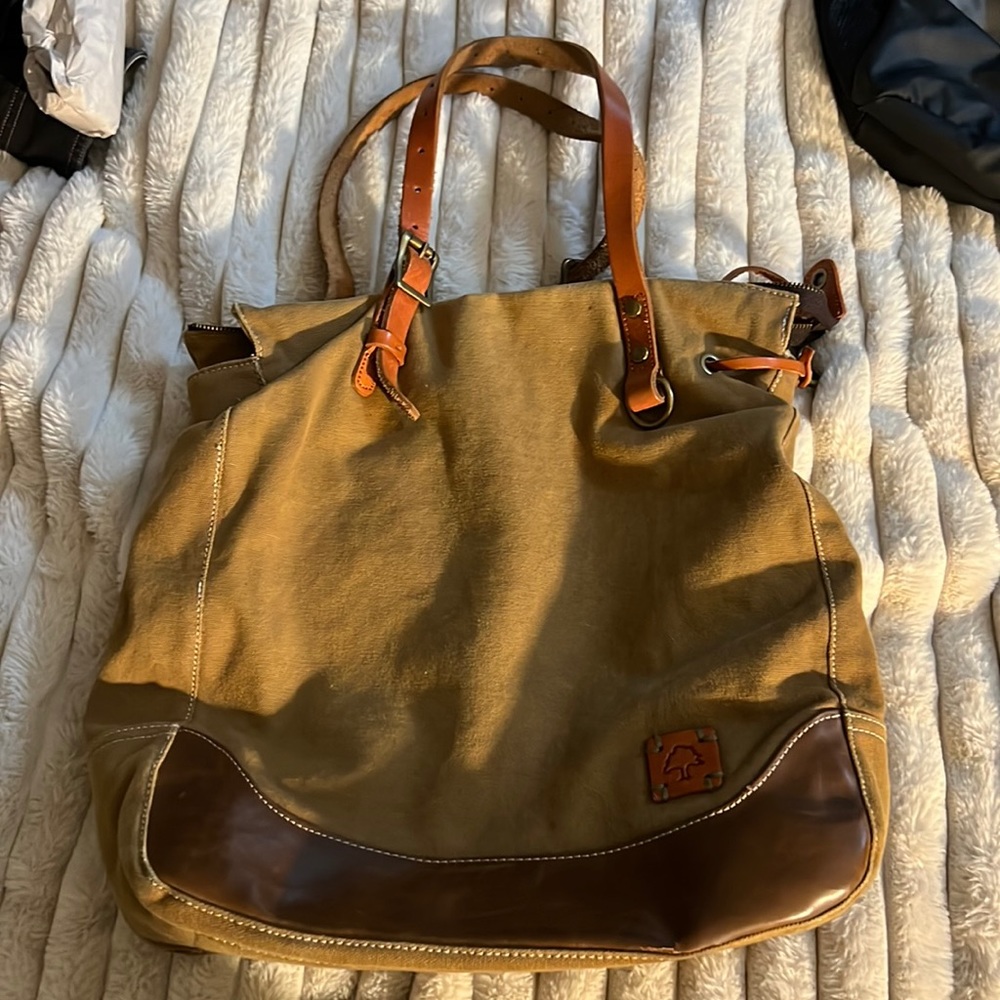 TSD brand redwood canvas with leather trim and straps.